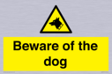 beware-of-the-dog-with-dog-warning-symbol~